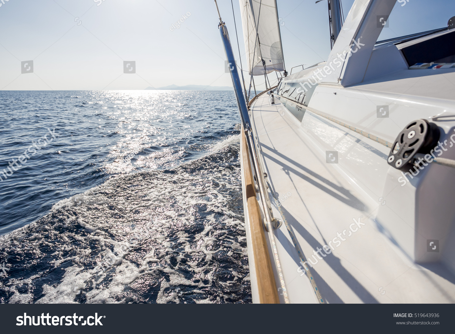 stock-photo-sail-vessel-surfing-on-the-sea-519643936
